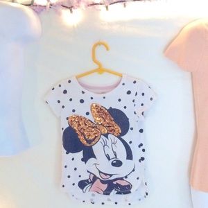 - Disneys Minnie Mouse girls sequin shirt.